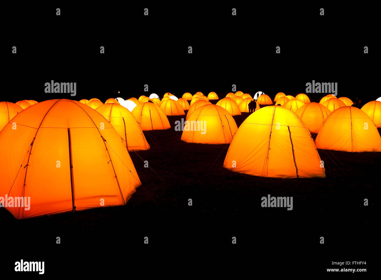 The Peace Camp coastal art installation of illuminated tents and soundscapes at Cuckmere Haven near Eastbourne, East Sussex Stock Photo