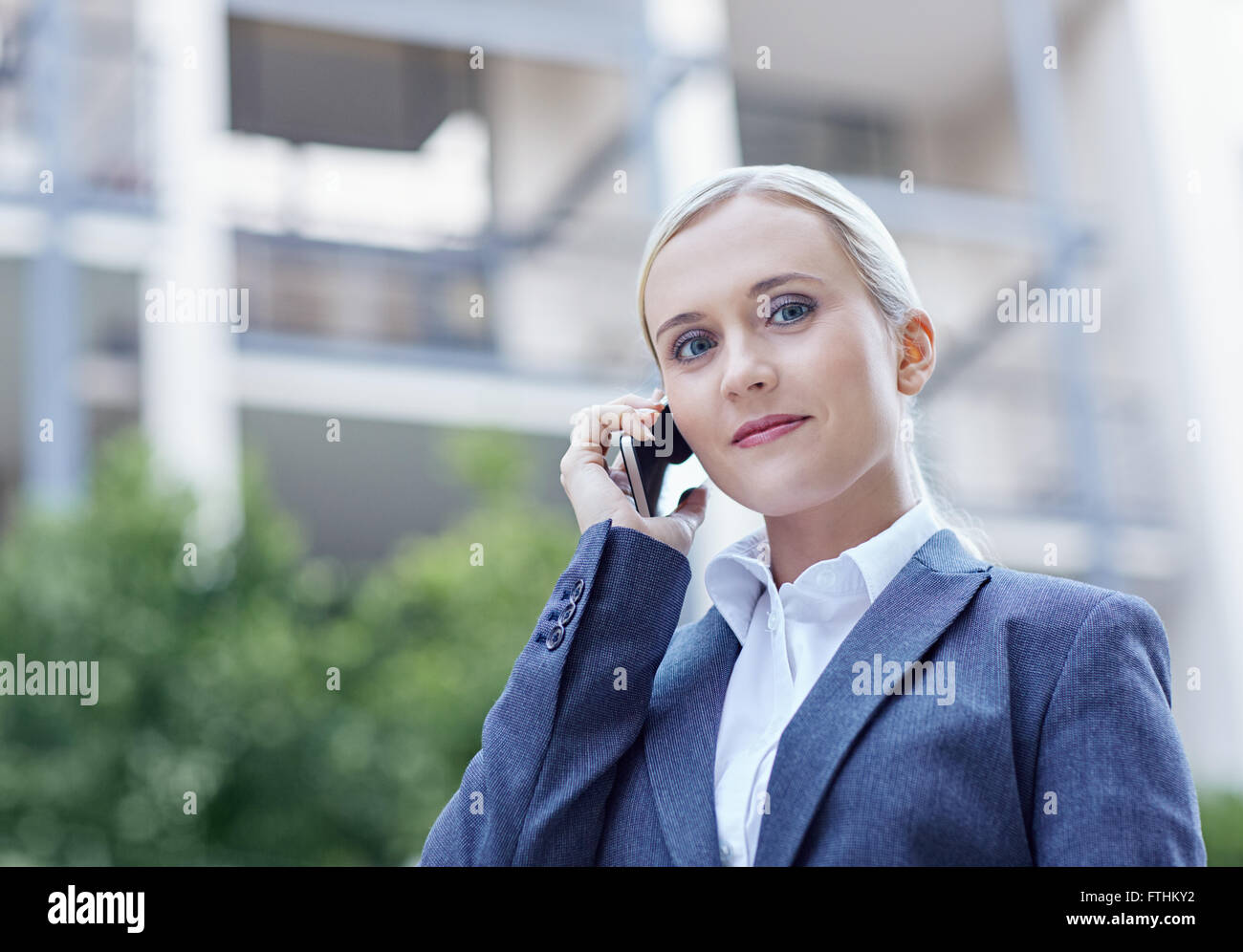 Blonde woman in business suit hi-res stock photography and images - Alamy