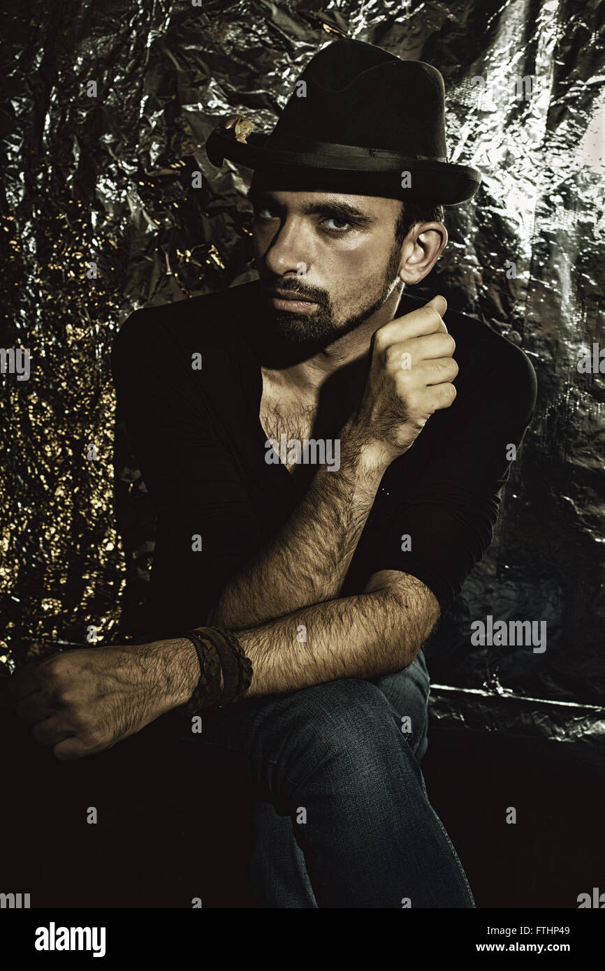 Man sitting chair studio shot hi-res stock photography and images - Alamy