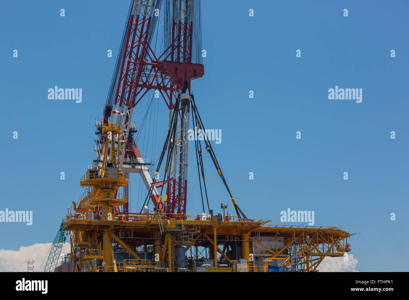 Oil rig lifting for installation on its jacket Stock Photo