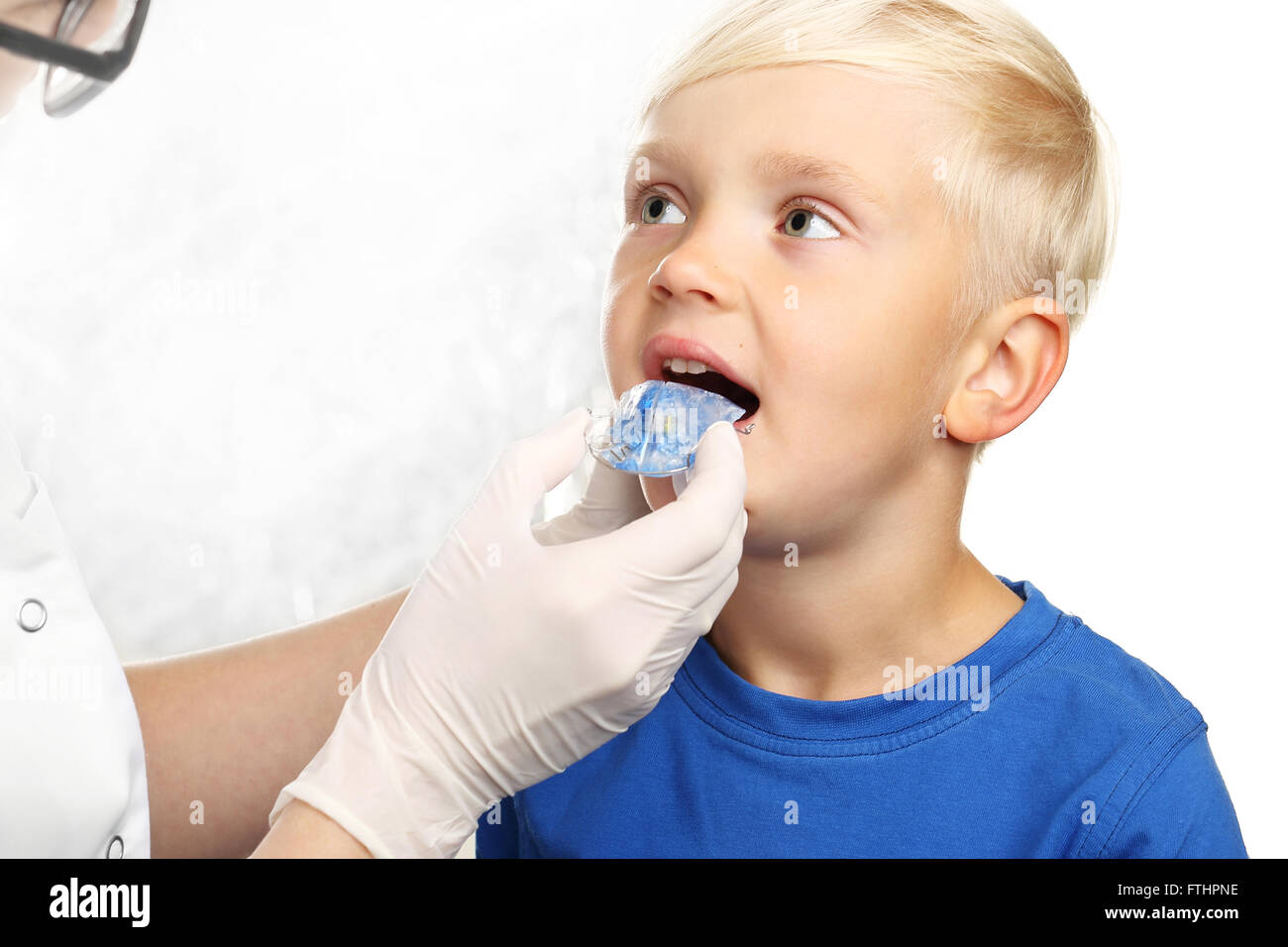 First braces, orthodontist child to the doctor. The little boy with