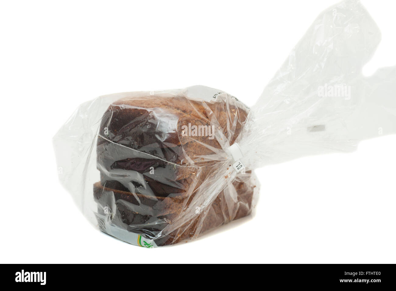 Bread in plastic bag isolated on white background Stock Photo Alamy