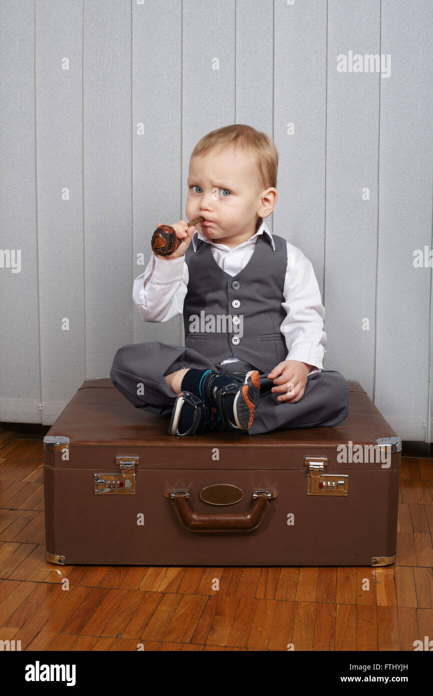 little boy with smoking pipe Stock Photo