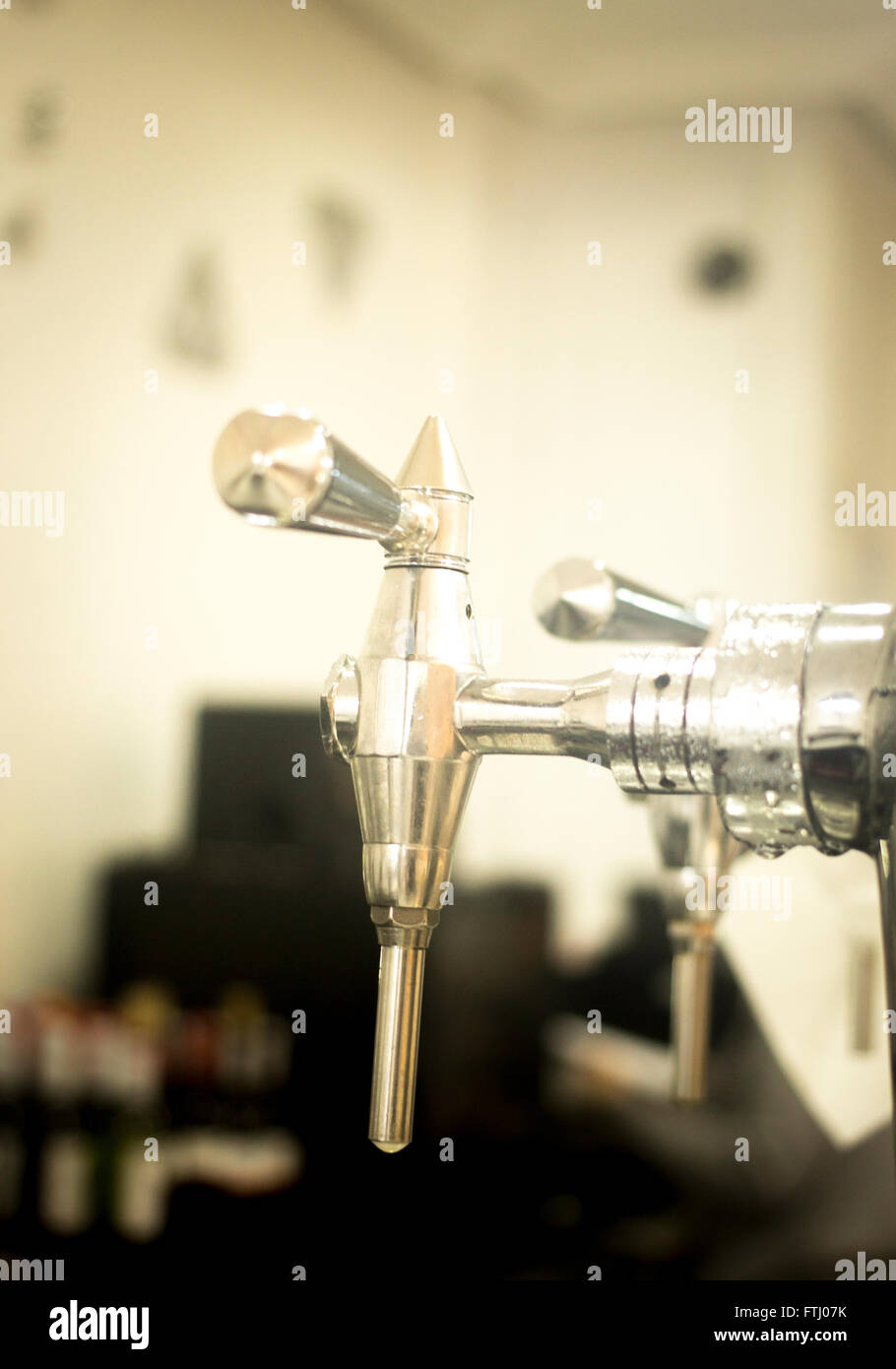 Draught beer pump tap in pub bar photo Stock Photo Alamy