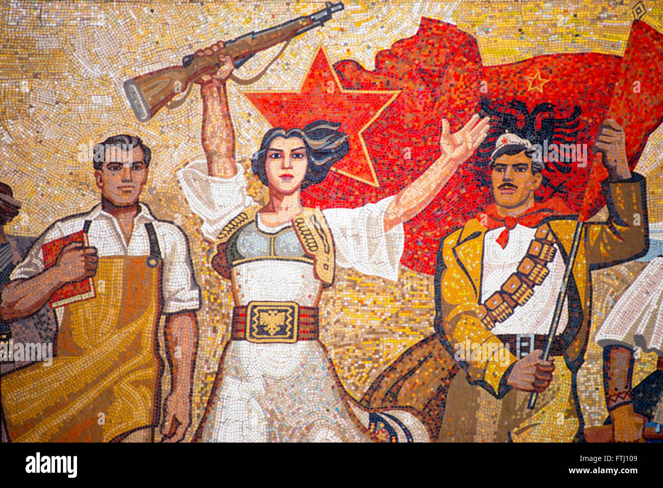 A heroic revolutionary mozaic in the main square, Tirana, 1990 Stock Photo