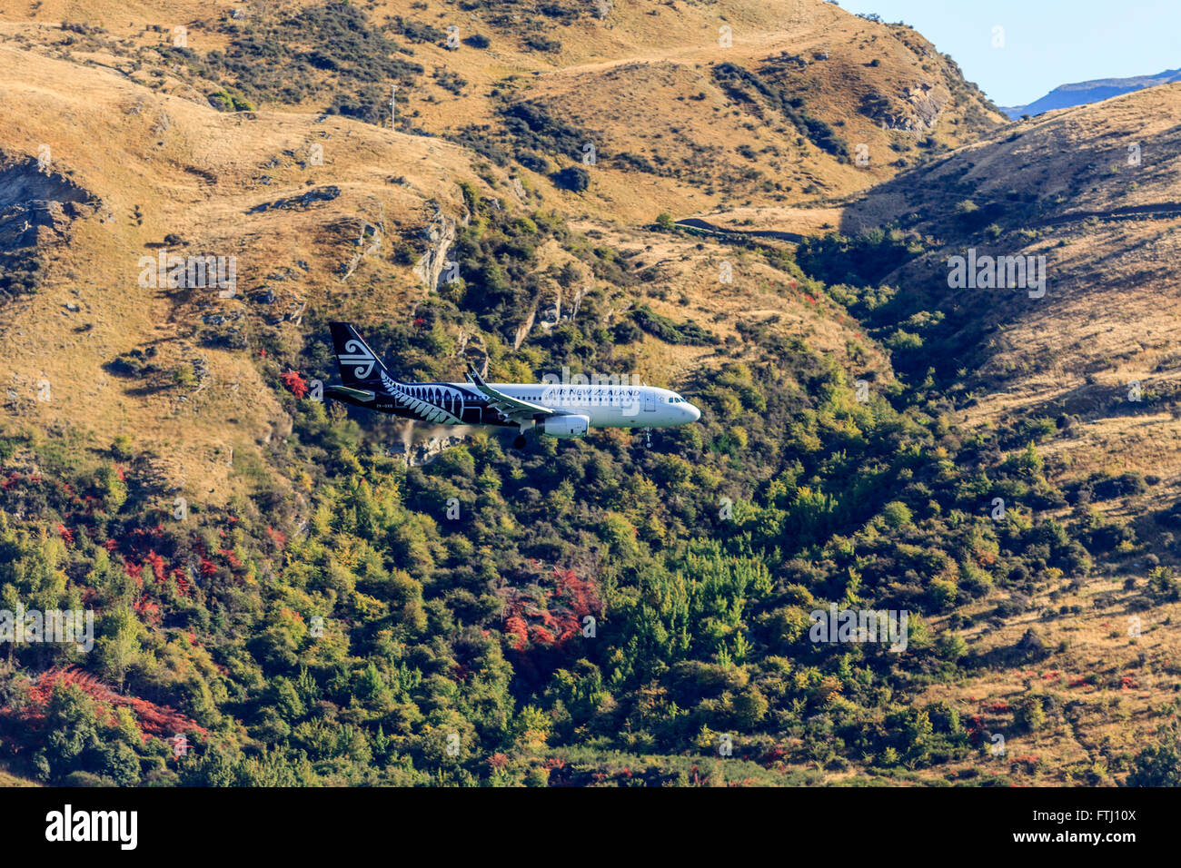 Air New Zealand airbus A320 twin jet,landing at ZQN airport,Queenstown,Central Otago,South Island,New Zealand Stock Photo