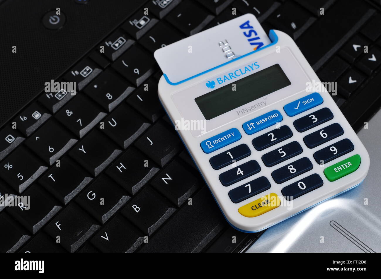 Pin sentry device on laptop keyboard stock photo alamy