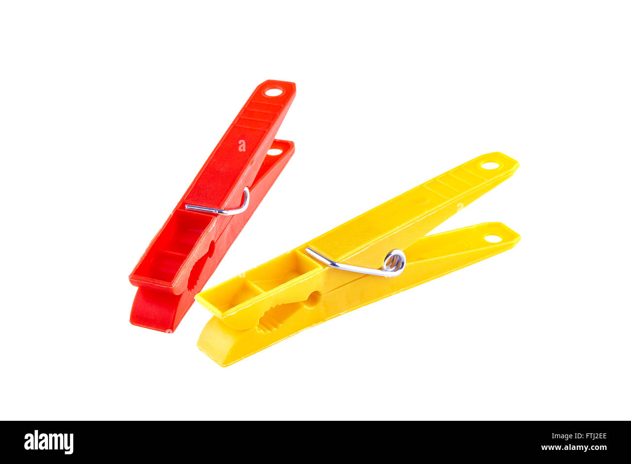 Two color clothes-pegs over white Stock Photo