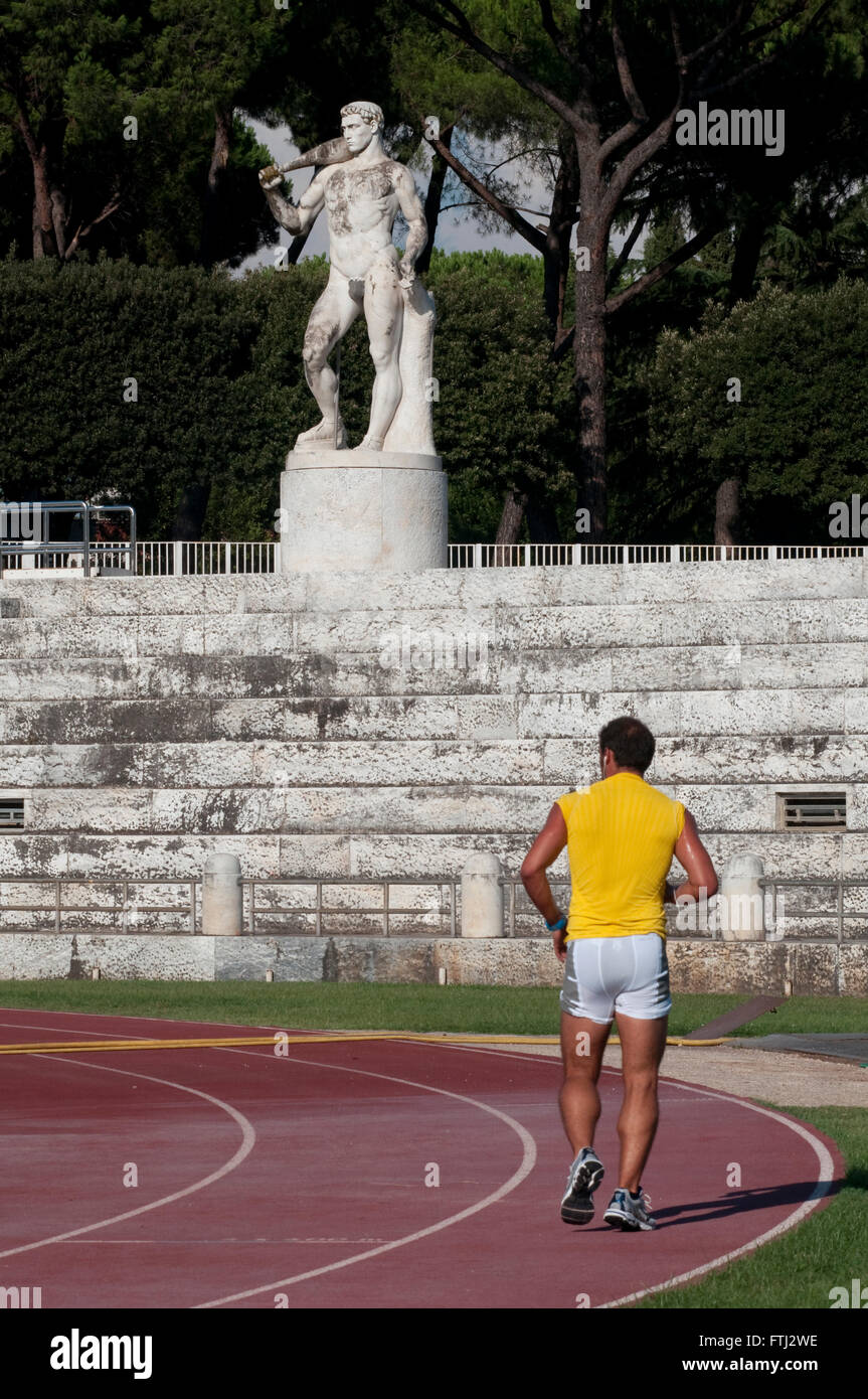 Italy, Lazio, Rome, Foro Italico, Marbles Statues and the Olympic Stadium Stock Photo