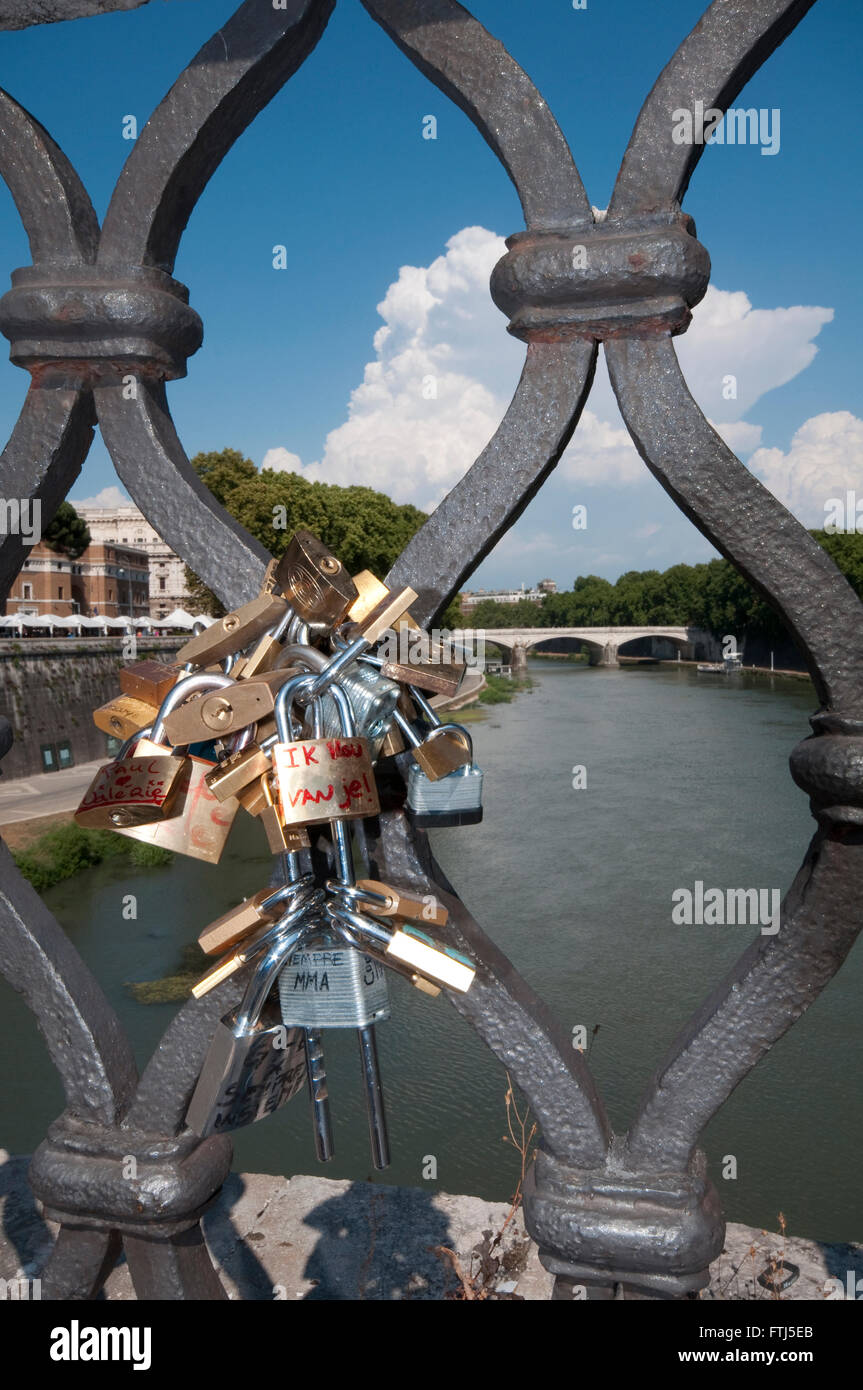 Italy, Lazio, Rome, Sant' Angelo Bridge, Lovers Locks Attached to Bridge Railings Stock Photo