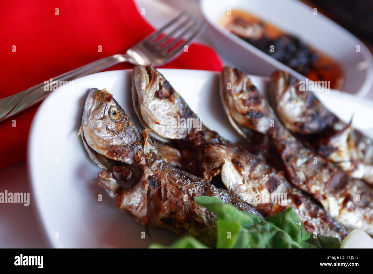 Oil fried fish hires stock photography and images Alamy
