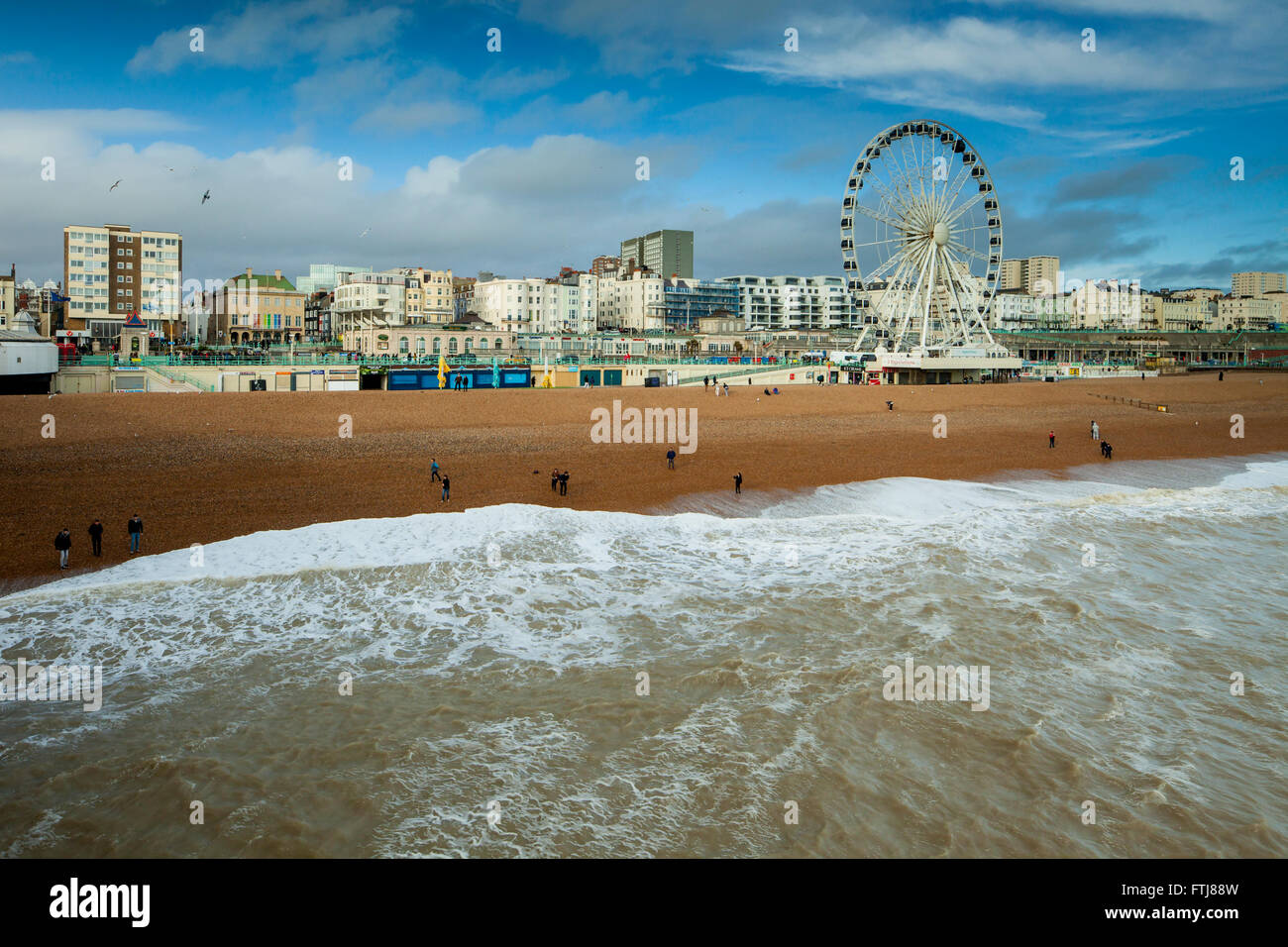 Spring afternoon on Brighton beach, East Sussex, England. Stock Photo
