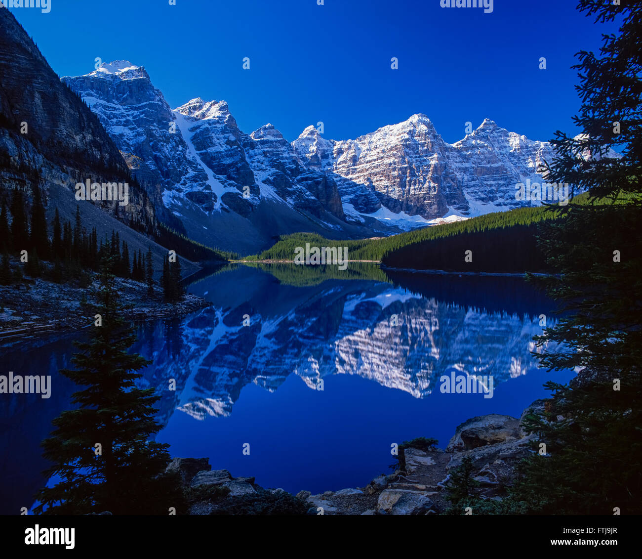 Moraine Lake is a glacially-fed lake in Banff National Park. Stock Photo