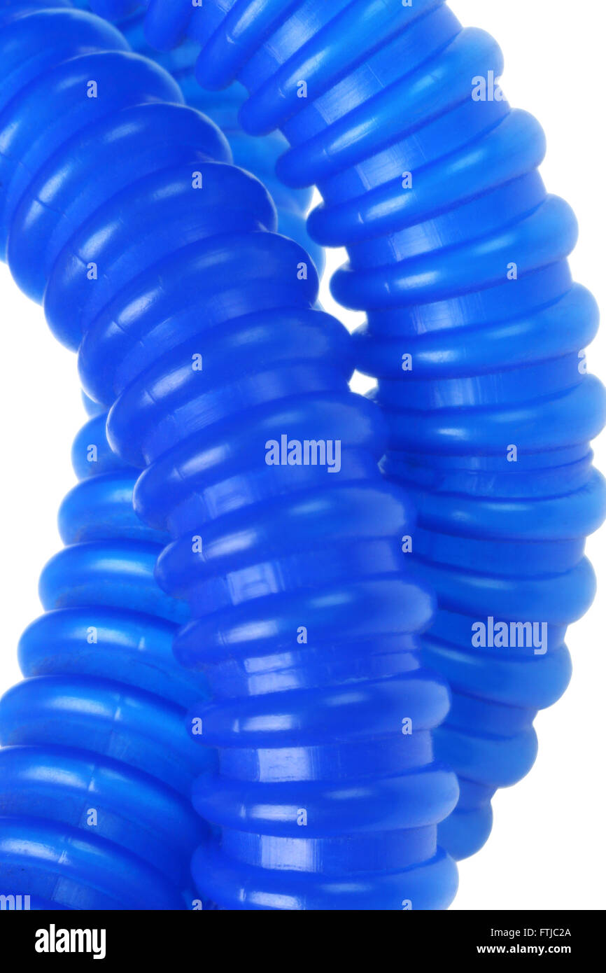 Close Up View of Flexible Plastic Tubing on White Background Stock Photo