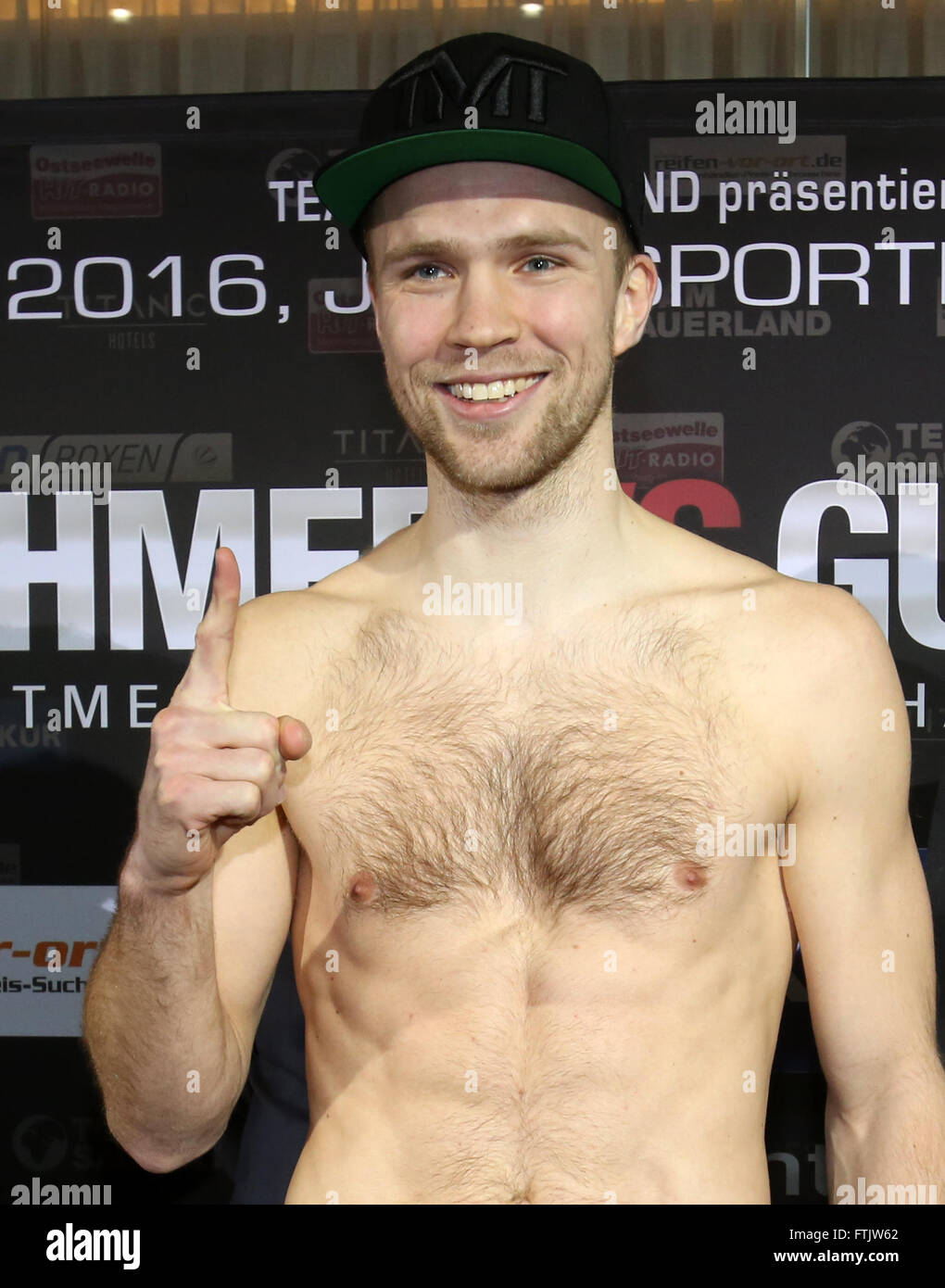 Neubrandenburg, Germany. 11th Mar, 2016. Stefan Haertel of Germany poses at  teh offical weigh in of the Boxgala in Neubrandenburg, Germany, 11 March  2016. PHOTO: BERND WÜSTNECK/DPA/Alamy Live News Stock Photo - Alamy