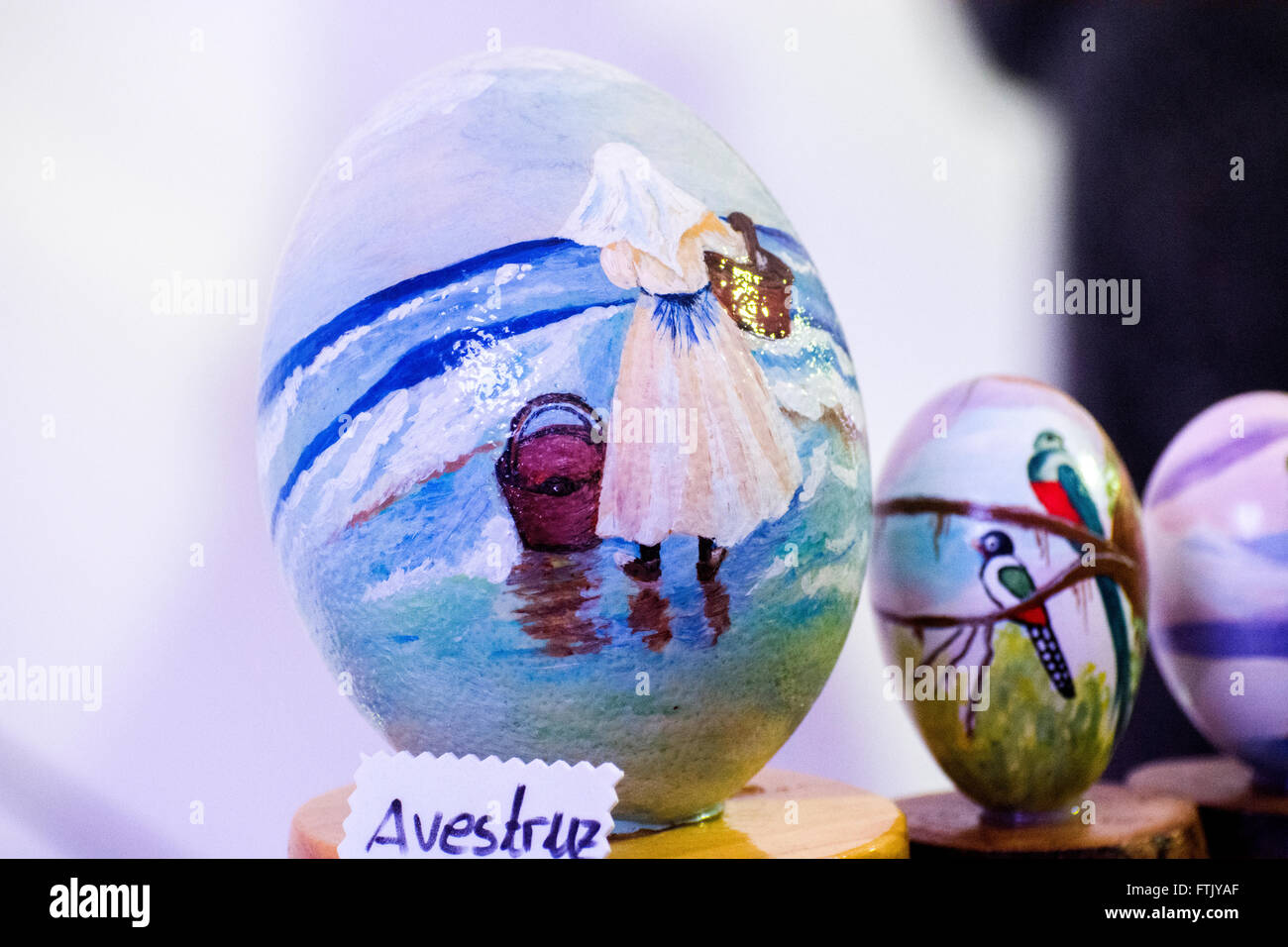 Pola de Siero, Spain. 29th March, 2016. A painted ostrich egg which represents a scene of a woman at the beach at the Feast of Easter Eggs of Pola de Siero, the only Spanish city in which this feast is celebrated, on the first Tuesday after Easter Sunday, with thousands of eggs painted by hand. © David Gato/Alamy Live News Stock Photo