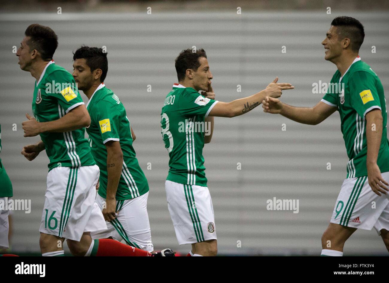Ciudad De Mexico, Mexico. 29th Mar, 2016. Mexico's Andres Guardado (2nd R) celebrates after scoring with his teammate Raul Jimenez (R) during the qualifying match for 2018 Russia World Cup against Canada at Azteca Stadium in Mexico City, capital of Mexico, on March 29, 2016. Mexico won 2-0. © Alejandro Ayala/Xinhua/Alamy Live News Stock Photo