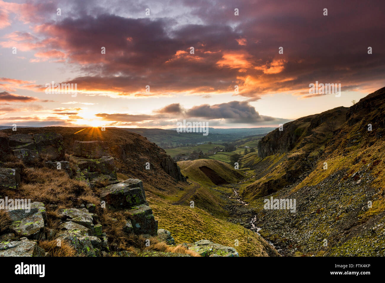 Holwick, Teesdale, County Durham UK.  Wednesday 30th March 2016. UK Weather.  Heavy overnight showers gave way to a colourful sunrise this morning. A day of sunny spells and showers is forecast at low levels, while at higher levels these may be of hail and snow, with thunder possible in the heaviest. Credit:  David Forster/Alamy Live News Stock Photo
