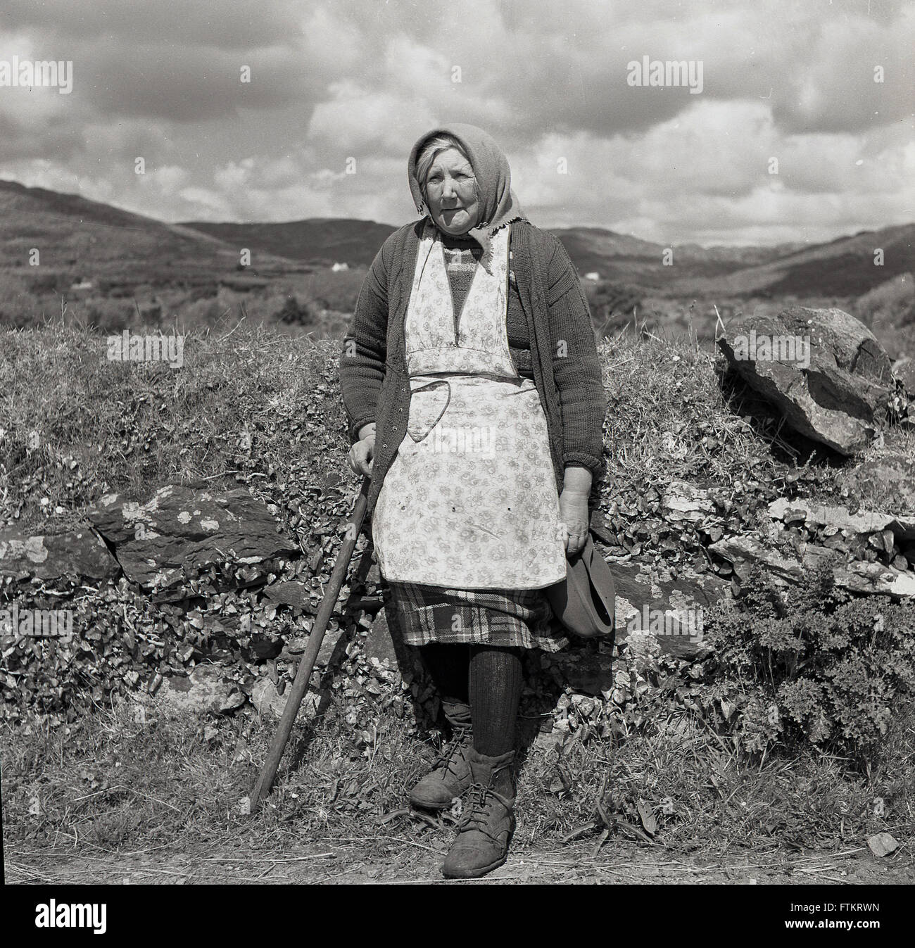 1950s historical, portrait of an Irish country woman wearing apron