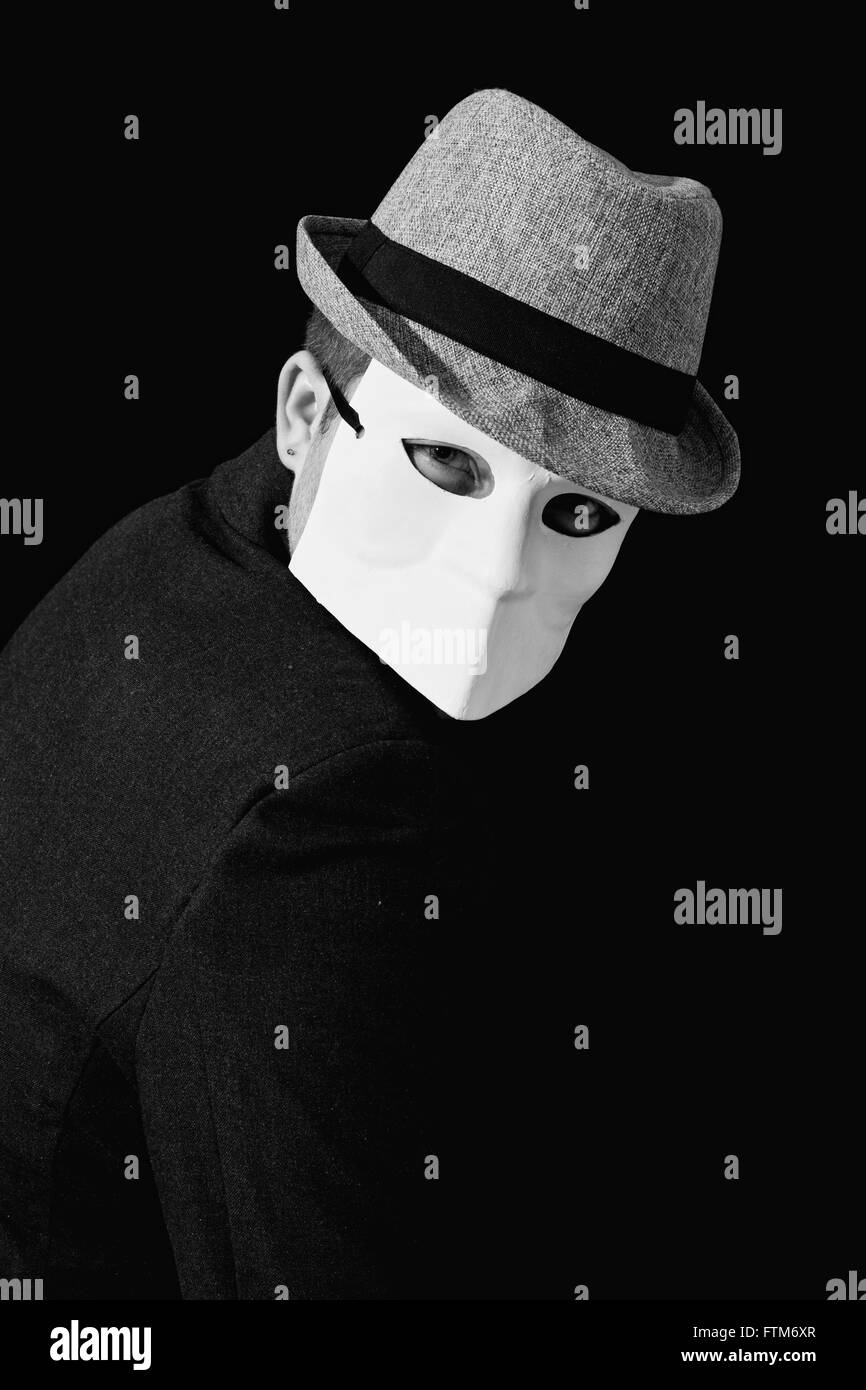 Holding mask Black and White Stock Photos & Images - Alamy