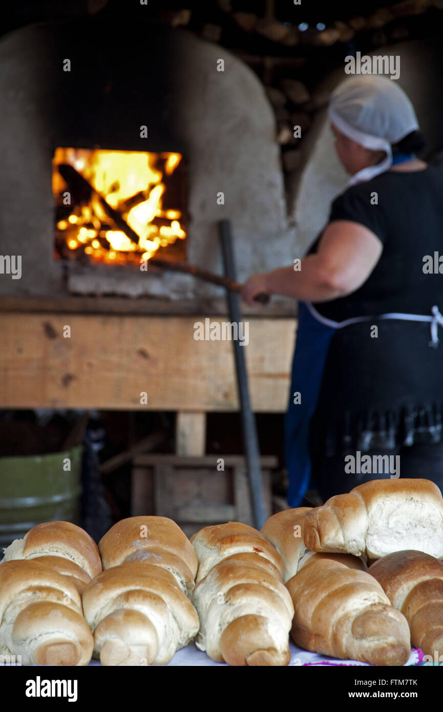 Woodstove and breads Stock Photo