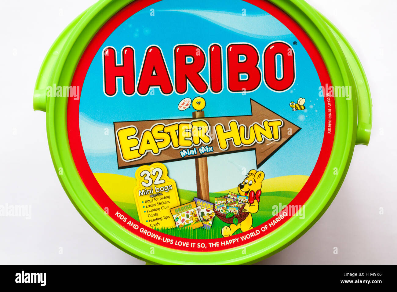 Tub of Haribo Easter Hunt mini mix sweets set on white background - ready for Easter Stock Photo