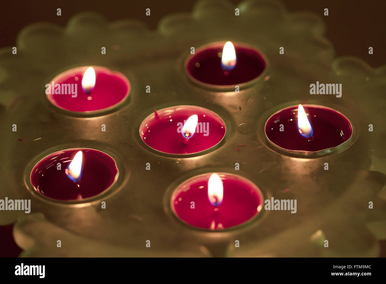 Lighted candles Stock Photo