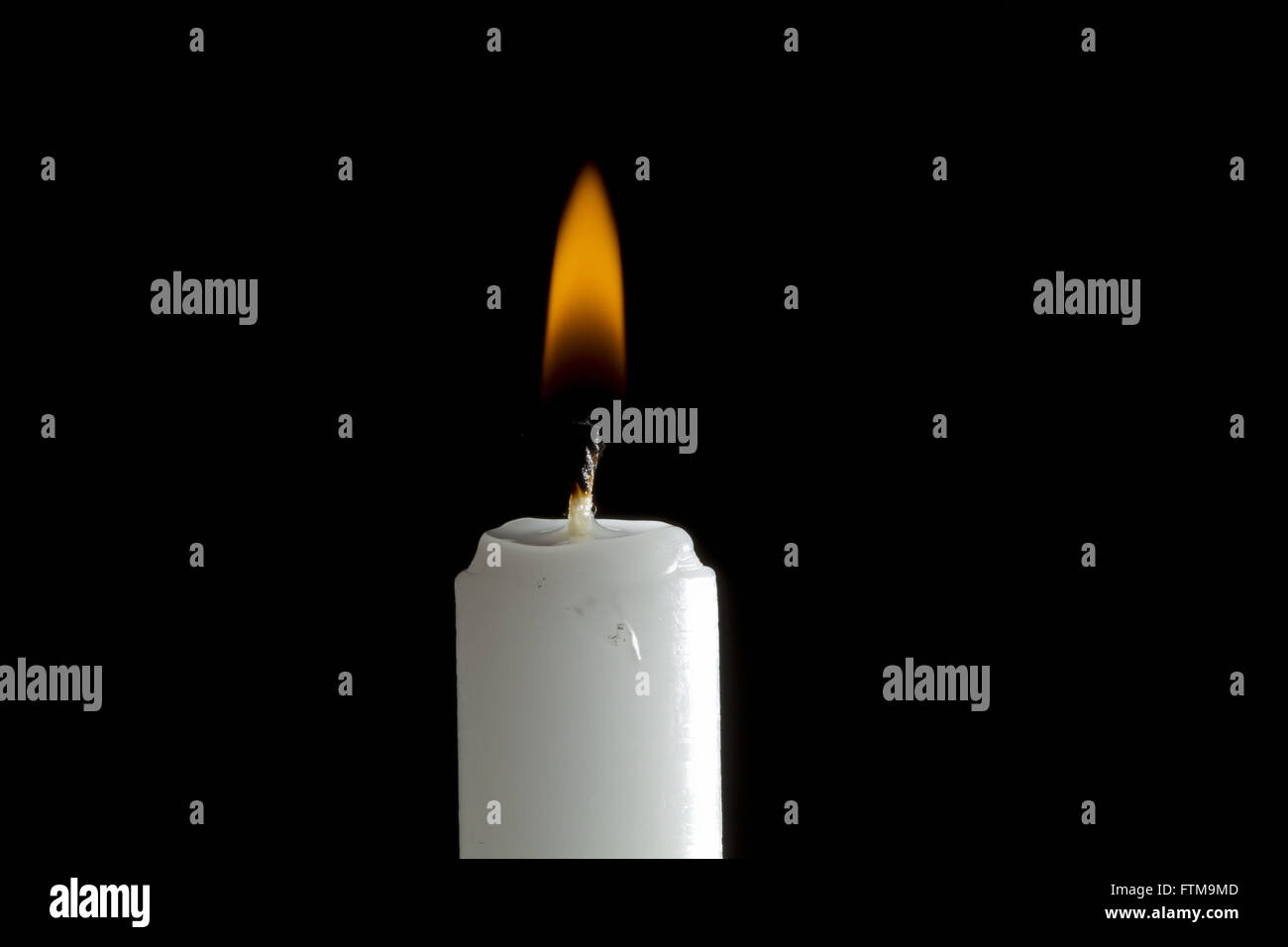 Lighted candle Stock Photo