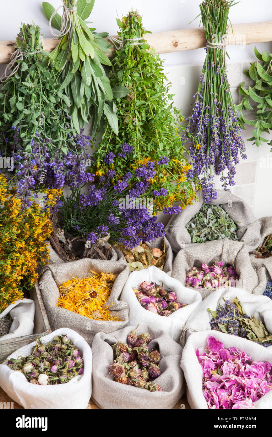 Healing medical herbs in a linen sacks Stock Photo