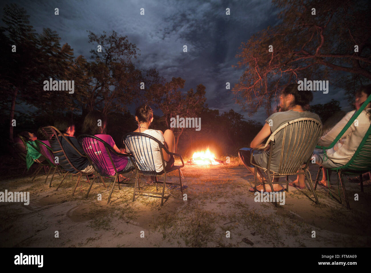 Tourists around the camp fire in Jalapao Stock Photo
