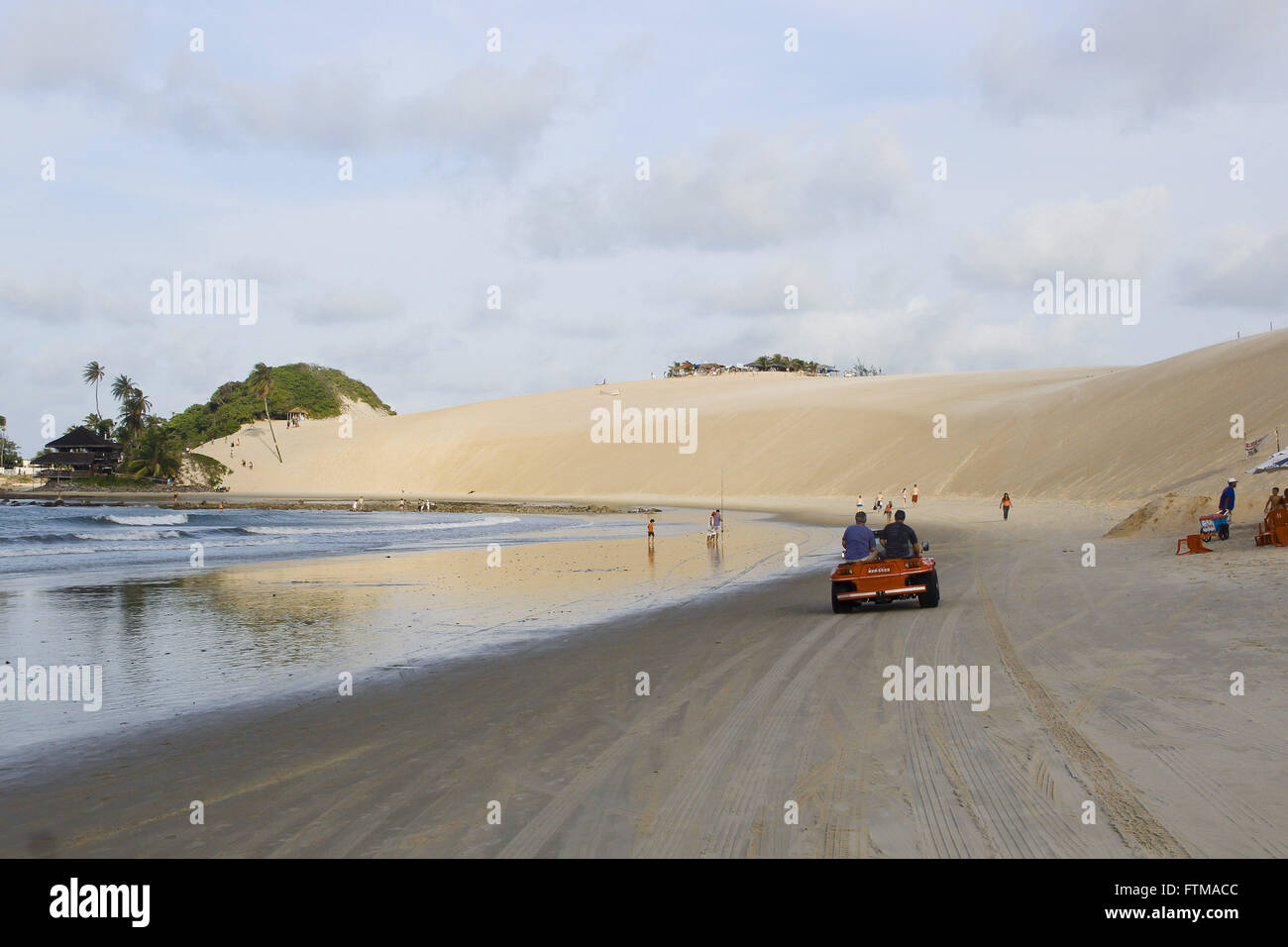 Buggy ride on the dunes of Genipabu Beach Stock Photo