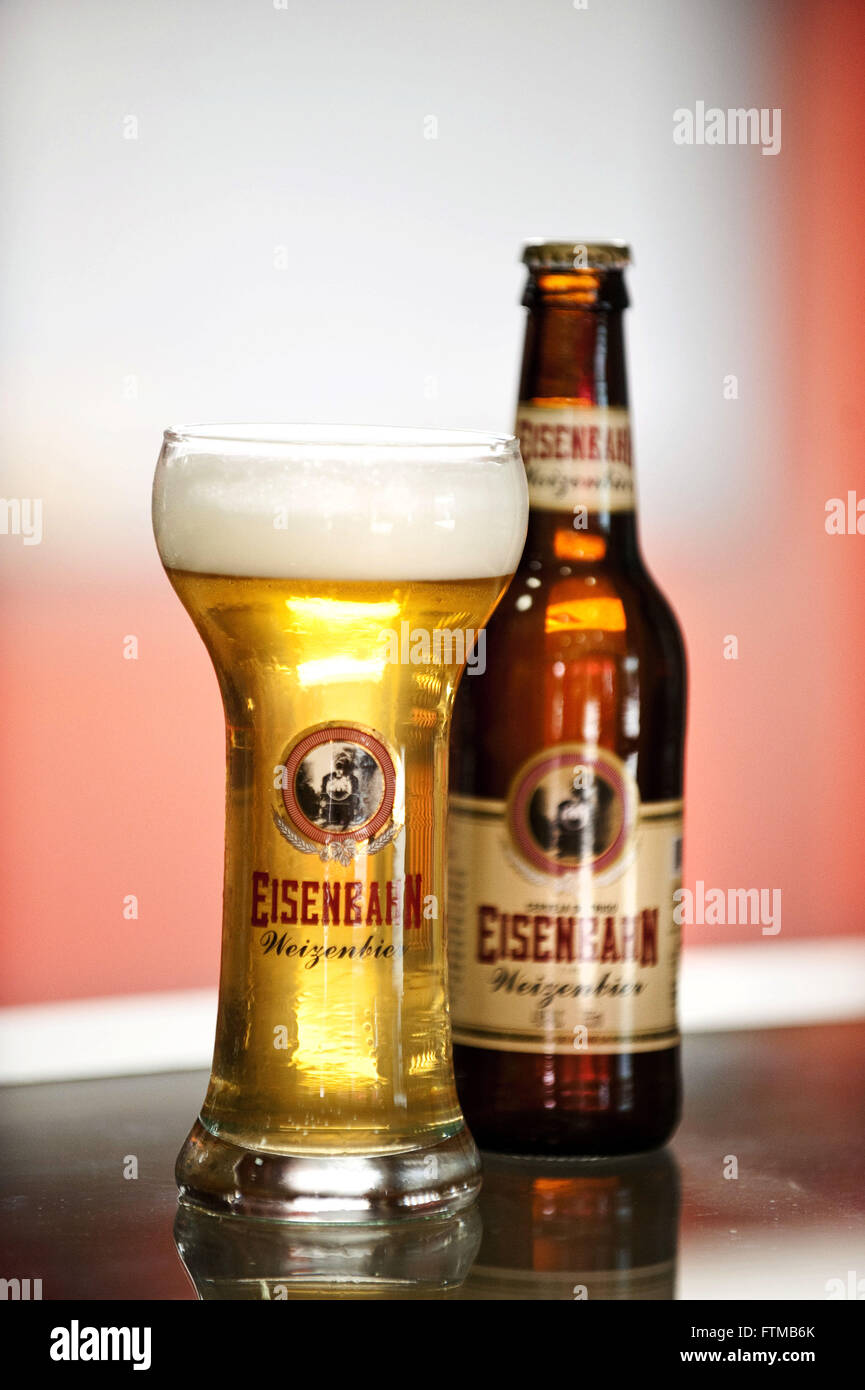 Large glass and bottle of craft beer in Brazil - Germany Beer Stock Photo