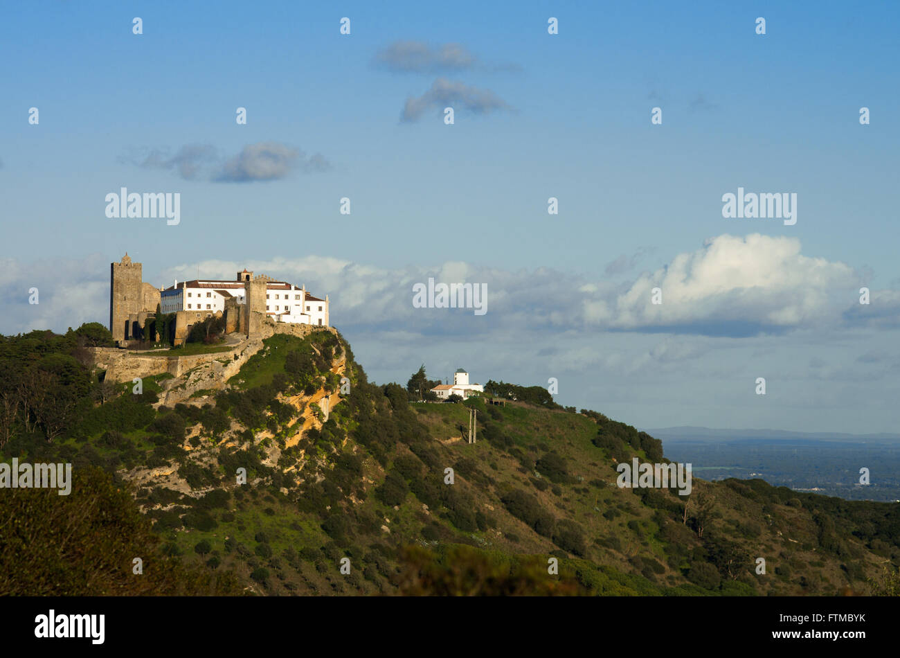 Palmela castle on top of the hill, under blue sky. Portugal Stock Photo