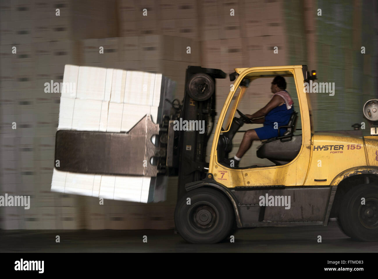 Forklift with bale of pulp in the Port of Santos - SP Stock Photo