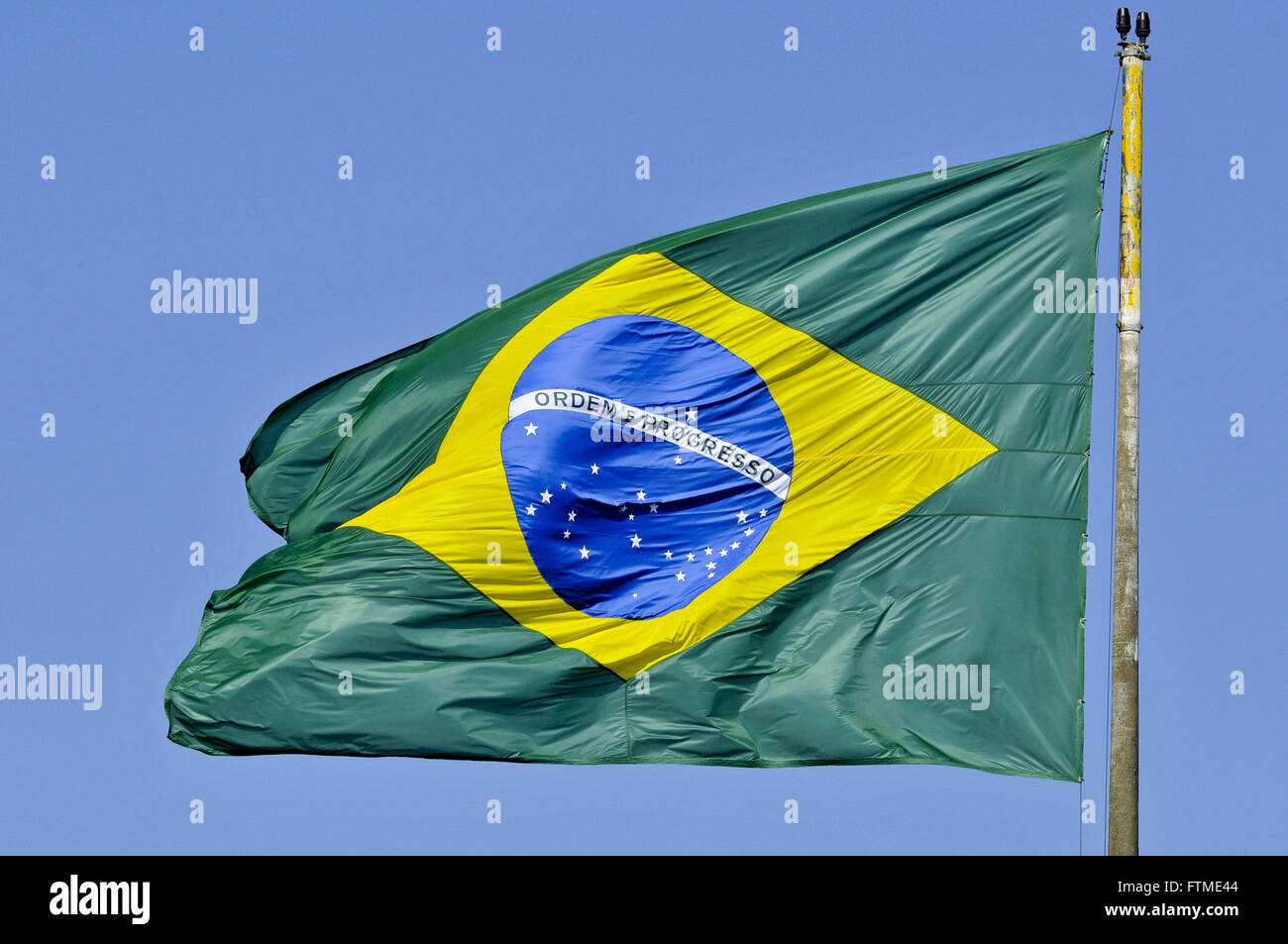 Brazilian flag - the city is bordered by Pedro Juan Caballero in Paraguay Stock Photo