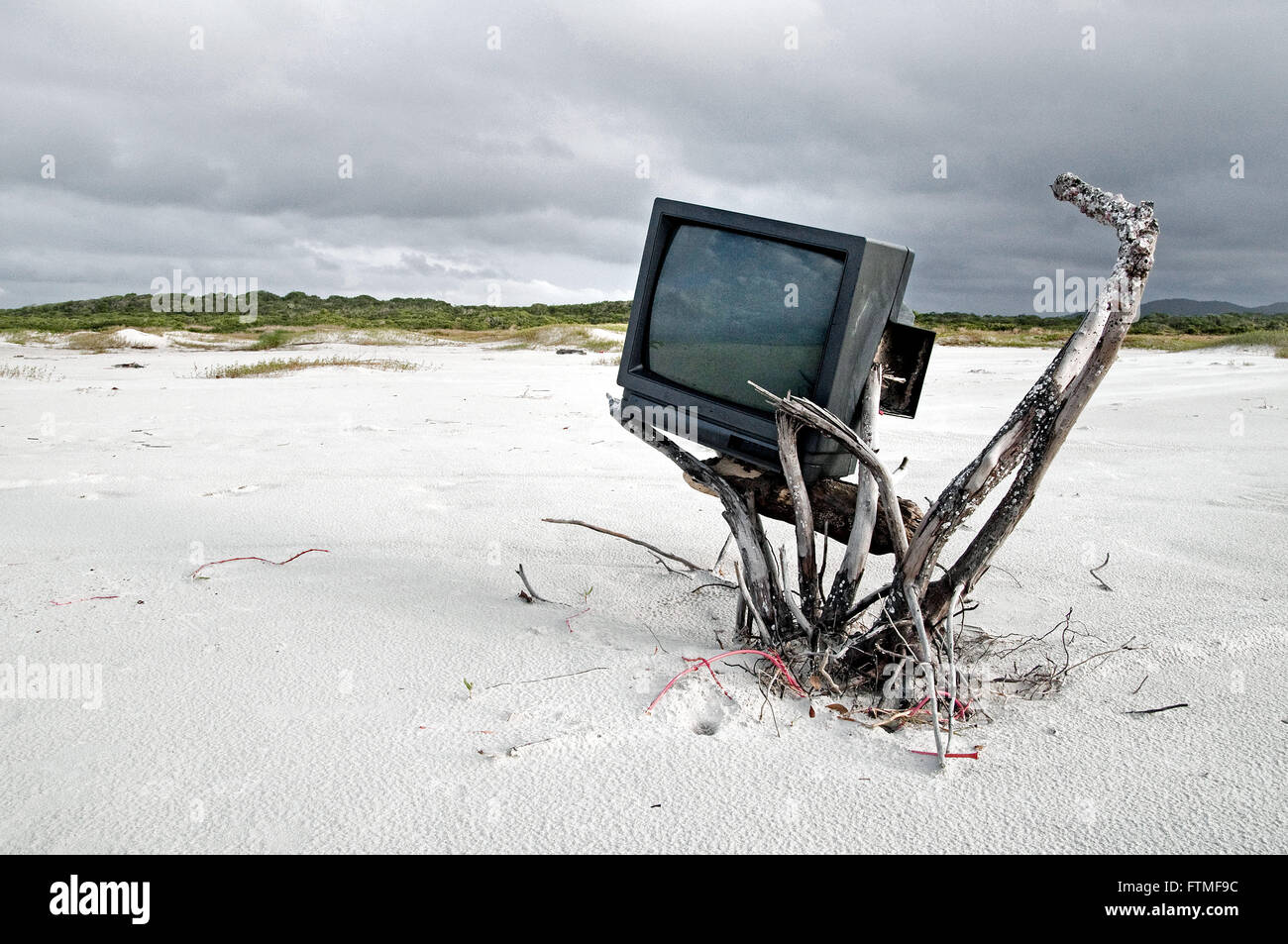 Carcass of television in Superagui Island beach area of environmental preservation Stock Photo