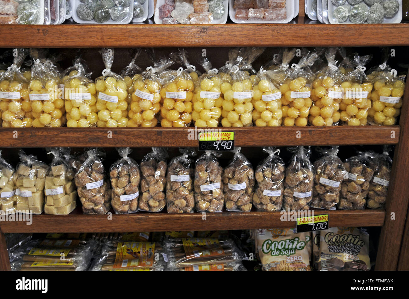 Miner typical sweet sale at store in town Araxa Stock Photo