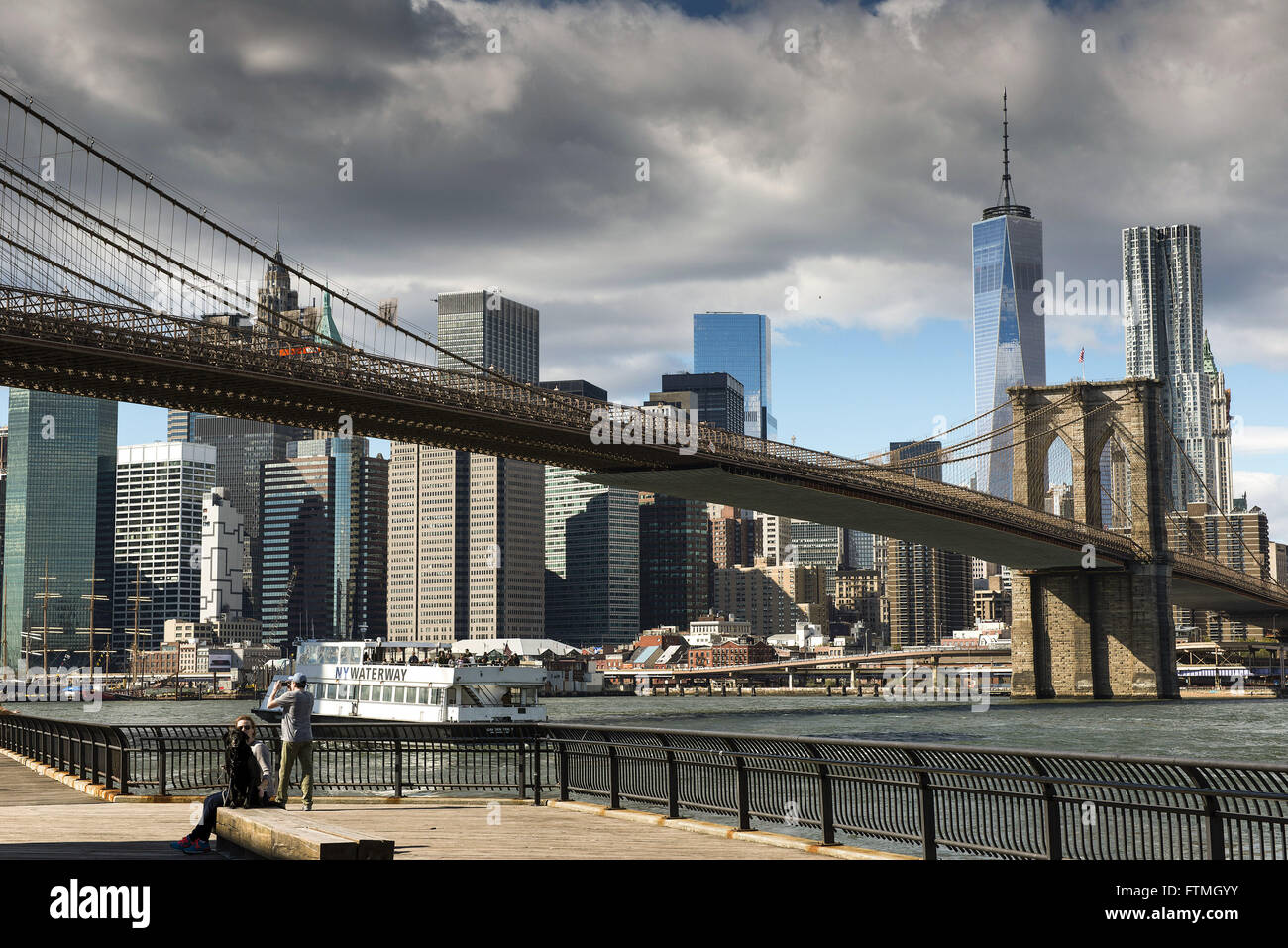 Brooklyn Bridge - Brooklyn Bridge with Business Center World Trade Center in Manhattan in the background Stock Photo