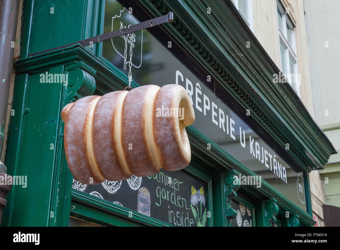 Traditional pastry shop selling Trdelnik the traditional Czech cinnamon pastry Stock Photo