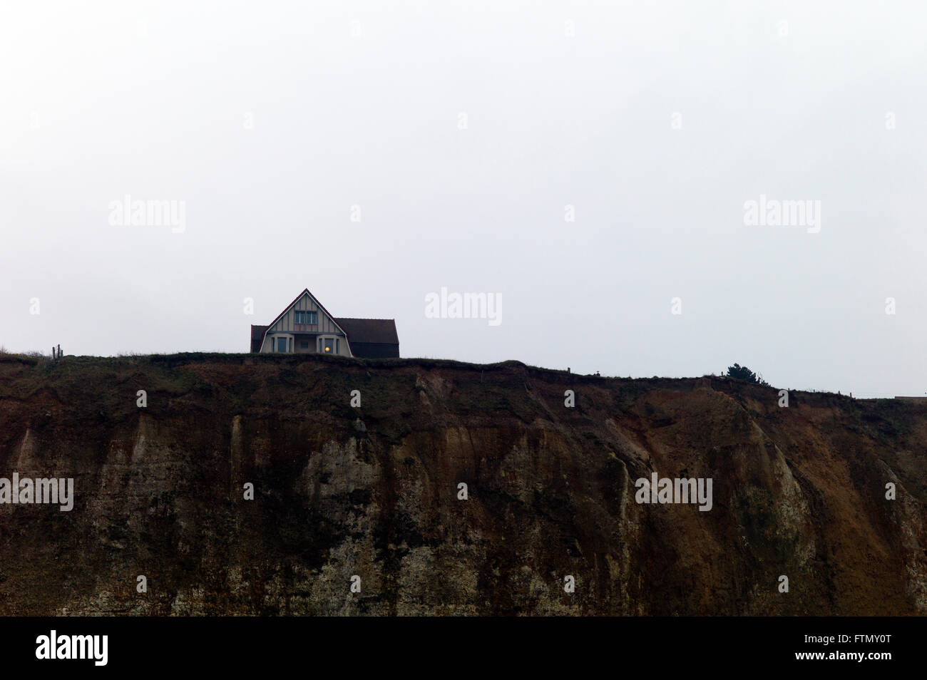Isolated house close to cliff edge, Normandy, France Stock Photo