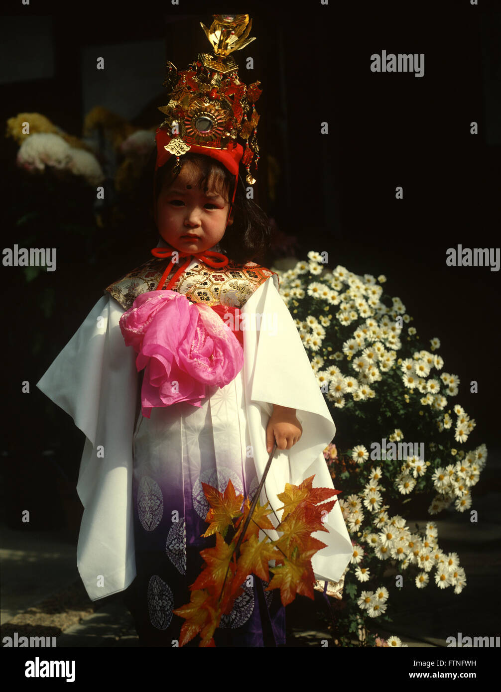 Japan, Japanese child dresed in traditional costume for a festival. Stock Photo
