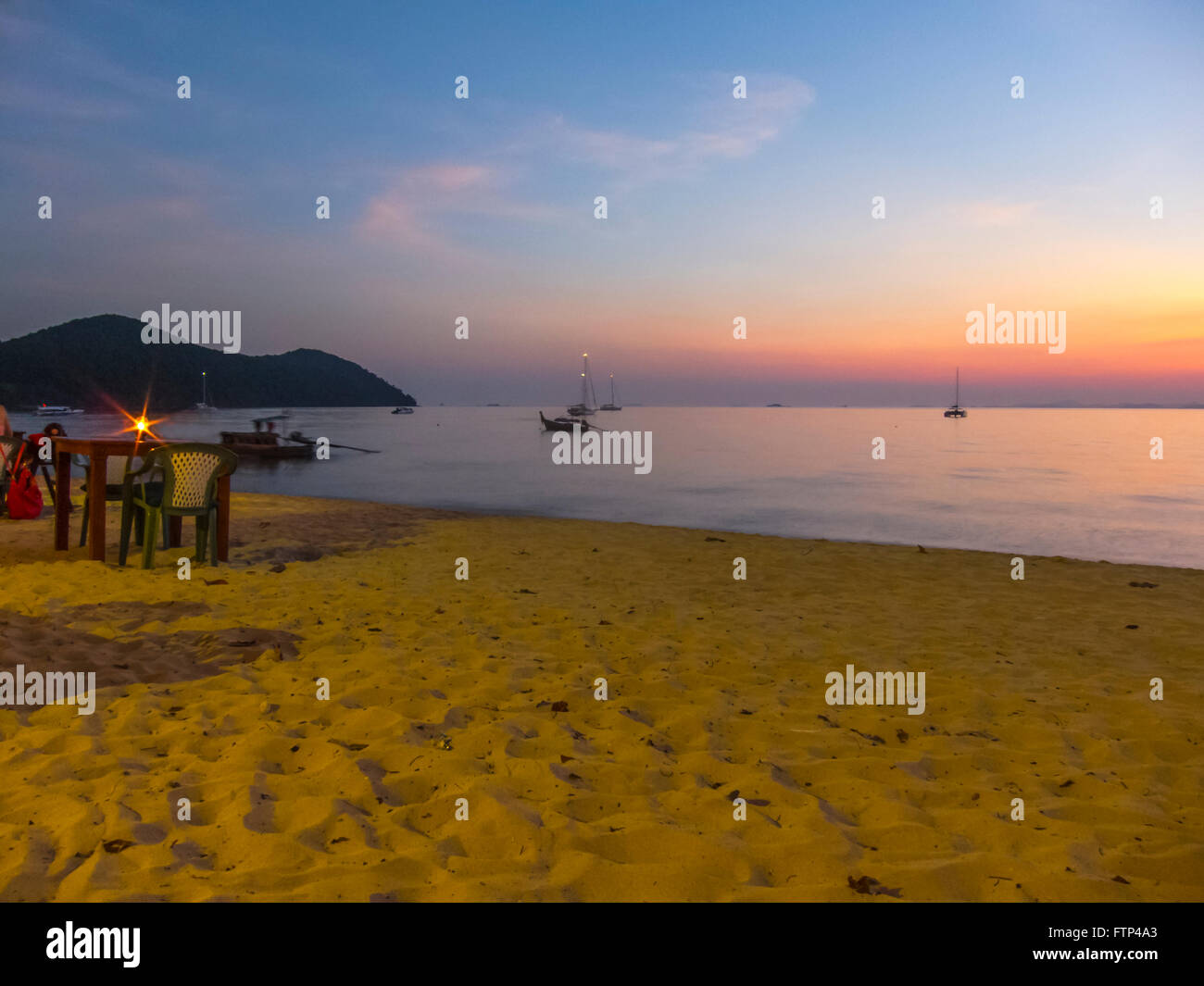 Amazing sunset, from the beach at the Yao Yai beach resort, Koh Yao Yai Thailand. Looking towards Phuket. Stock Photo