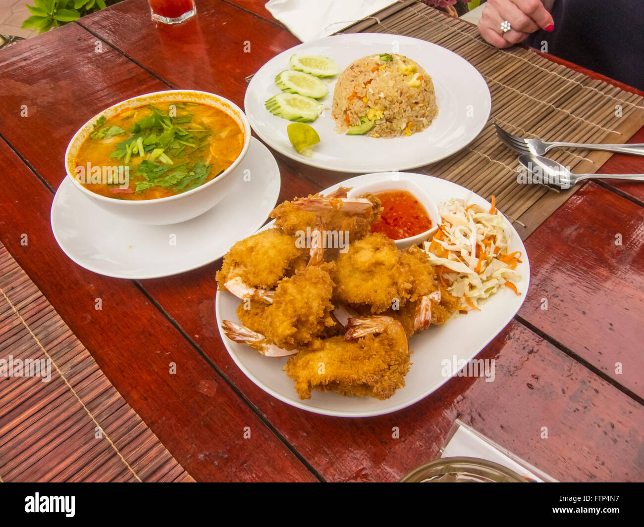 Thai meal served on the beach at the Yao Yai Beach Resort in Koh Yao Yai Island Thailand Stock Photo