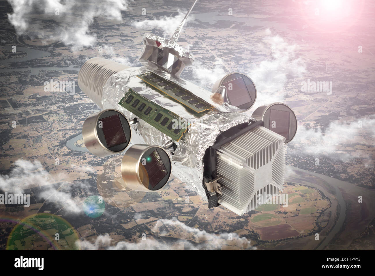 Homemade solar powered spaceship satellite in orbit around earth Stock