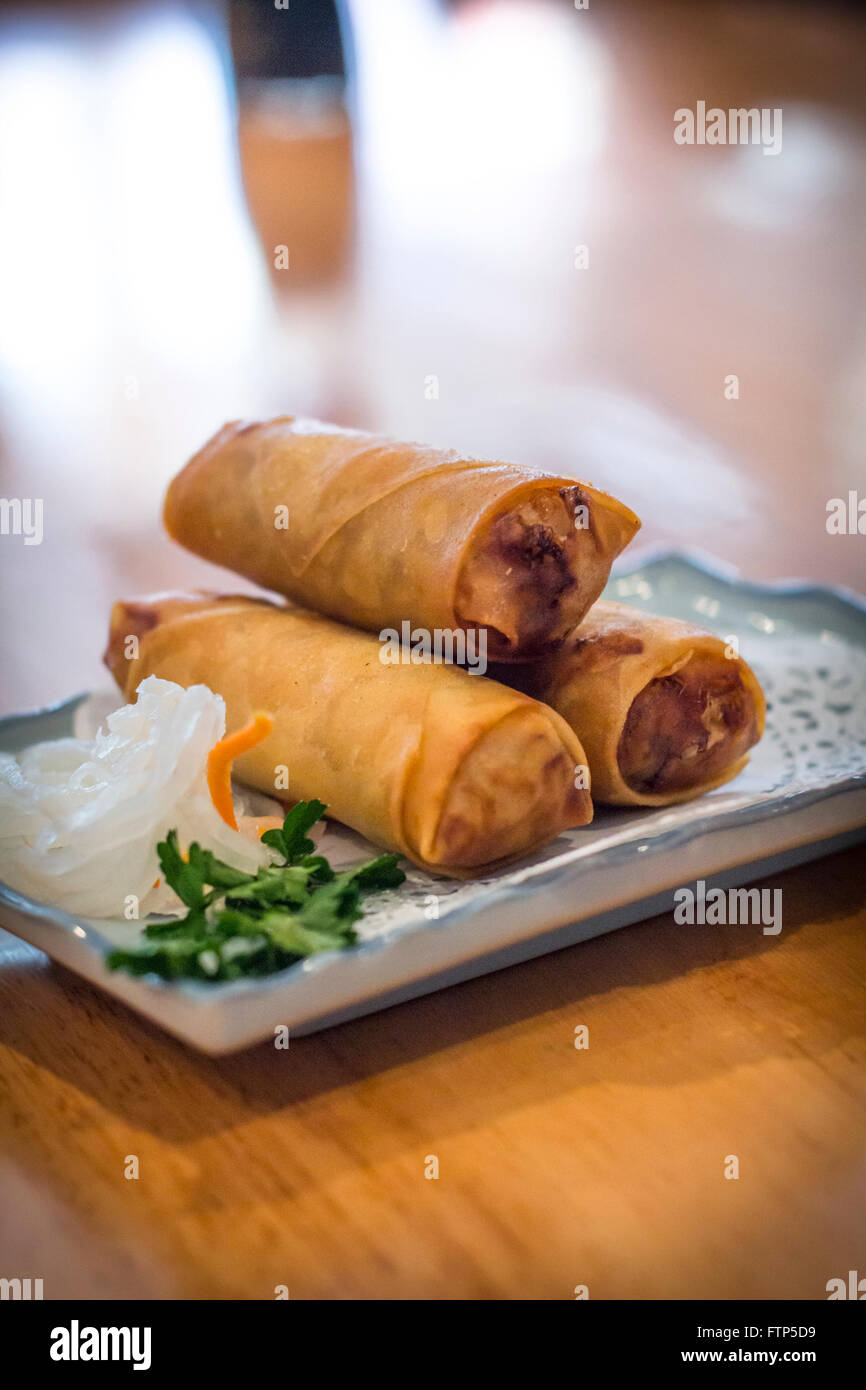 Japanese fried springrolls with shredded pickled radish and cilantro
