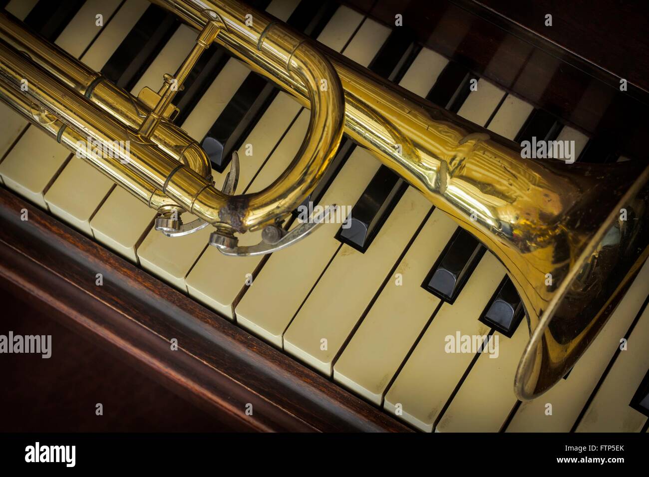Old and worn Jazz trumpet and piano musical background Stock Photo Alamy