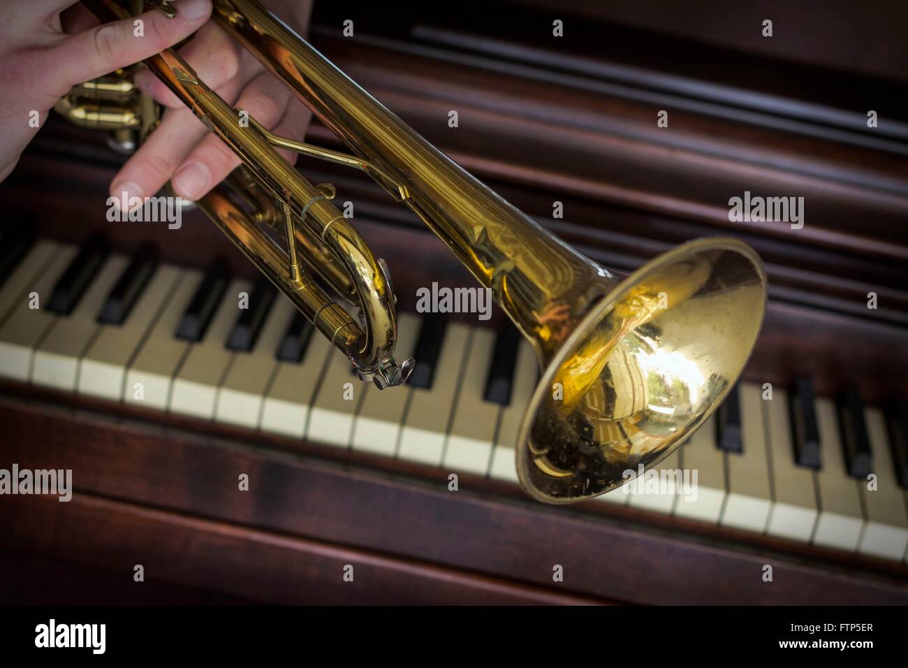 Old and worn Jazz trumpet and piano musical background Stock Photo Alamy