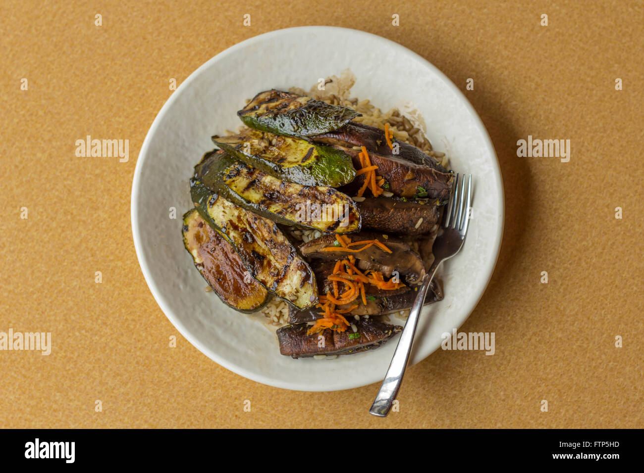 Grilled zucchini and portobello mushrooms in balsamic vinegar glaze