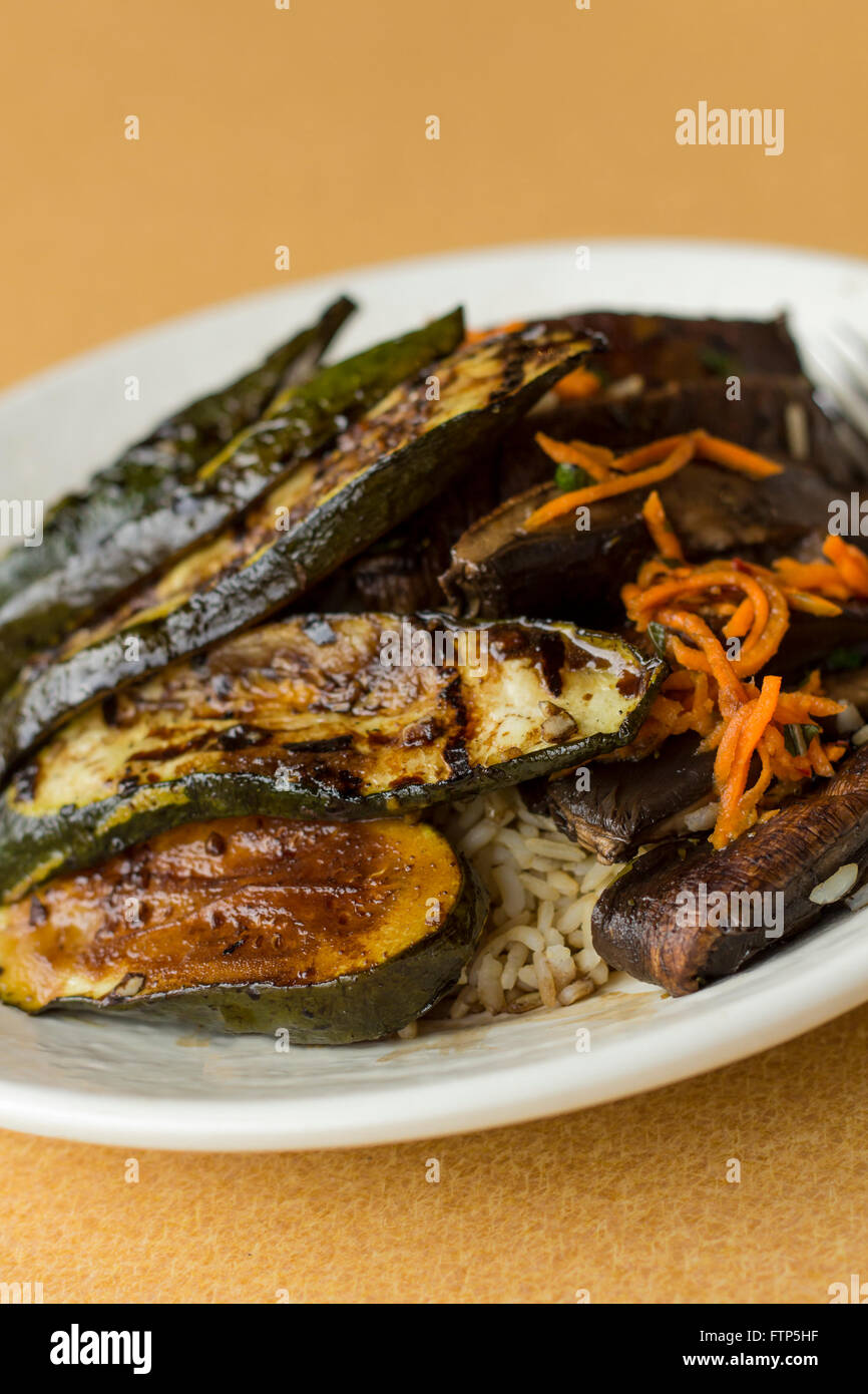 Grilled zucchini and portobello mushrooms in balsamic vinegar glaze