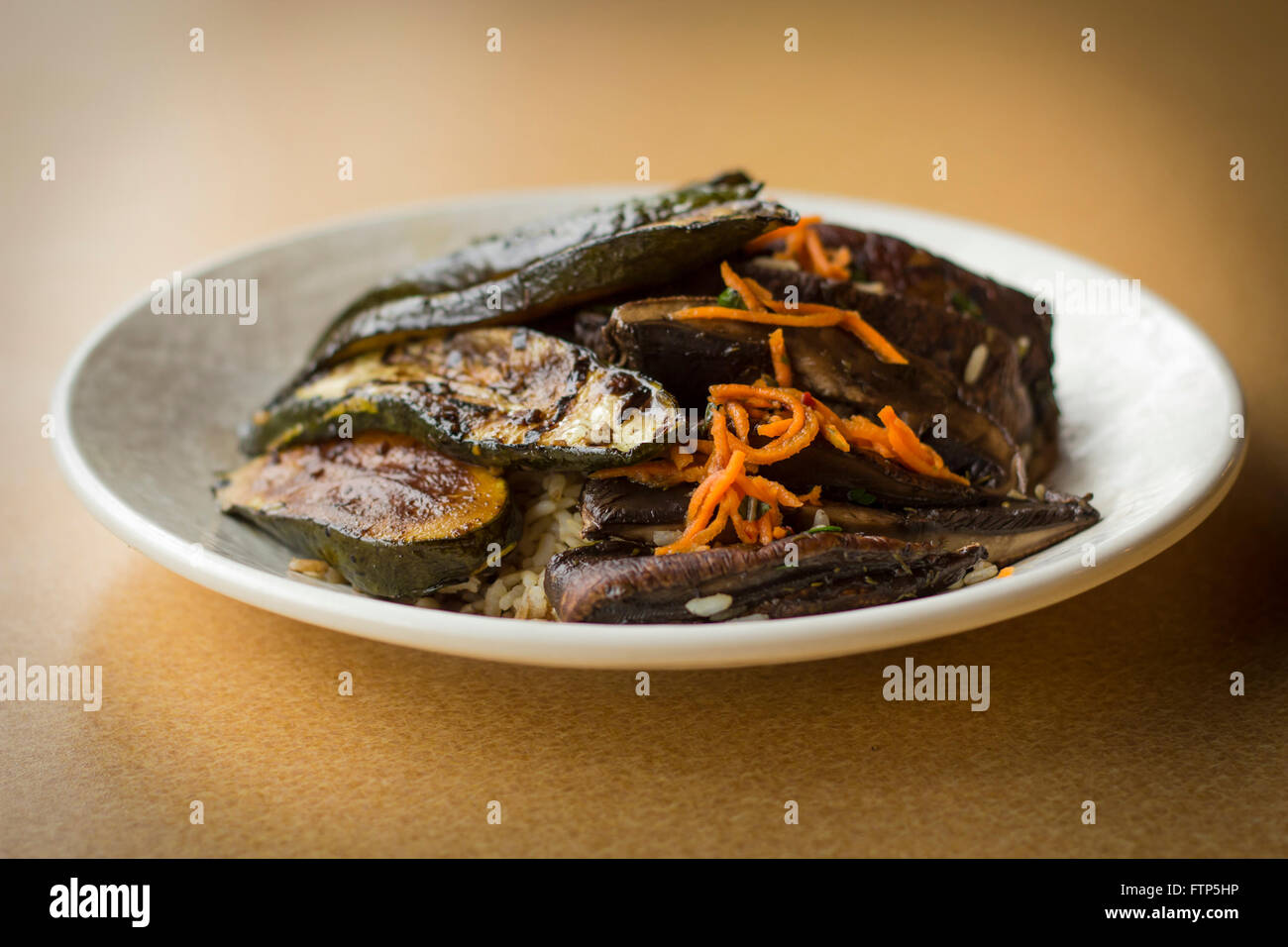 Grilled zucchini and portobello mushrooms in balsamic vinegar glaze